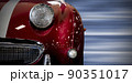 Front view of a vintage red car with speed background 90351017