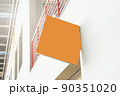 Mockup of an orange shop sign 90351020