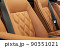 Part of brown leather luxury car seat 90351021