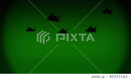 Apache AH-64 helicopters fly at night, night vision infrared Apache AH-64 helicopters fly at night, night vision infrared 90353162
