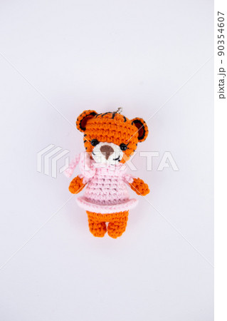 knitted bear toy on a white background knitted bear toy on a white background 90354607