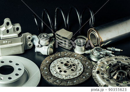 Close up of new car parts on black background 90355623