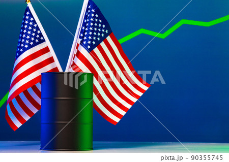 Price of american oil is changing concept. Black barrel with oil and graph 90355745
