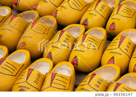 Alkmaar, Netherlands, May 2022. The traditional painted Dutch clogs Alkmaar, Netherlands, May 2022. The traditional painted Dutch clogs 90356147
