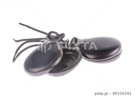 Isolated pair of Spanish castanets 90356391