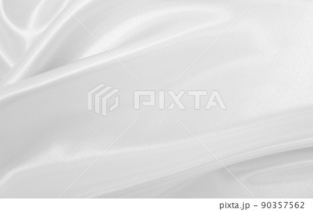 Smooth elegant white silk or satin luxury cloth texture as wedding background. Luxurious background design 90357562