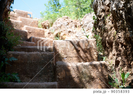 Steps carved into the rock on a hiking trail. River Nahal Ayun. Reserve and national park. Upper Galilee, Israel 90358393