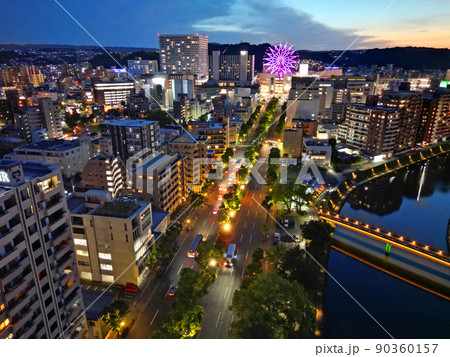 鹿児島市の甲突川緑地とナポリ通りの夜景空撮 鹿児島市の甲突川緑地とナポリ通りの夜景空撮 90360157