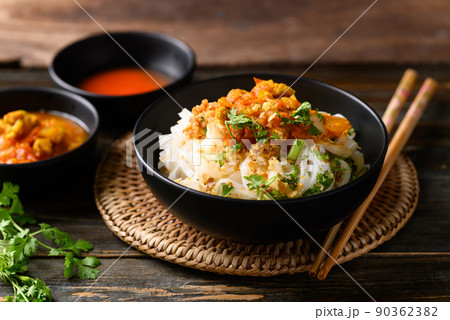 Rice noodle mixed with spicy tomatoes sauce, Tai Yai food in Northern of Thailand Rice noodle mixed with spicy tomatoes sauce, Tai Yai food in Northern of Thailand 90362382
