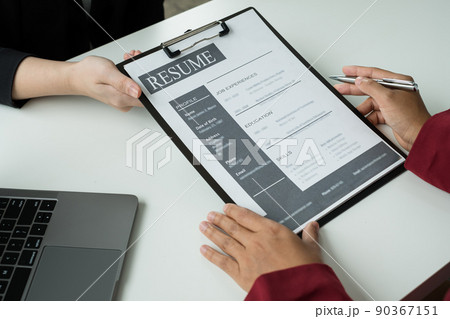 Business people hold a resume and talk to job applicants for job interviews about careers and Their personal history in the company. Recruitment concepts 90367151