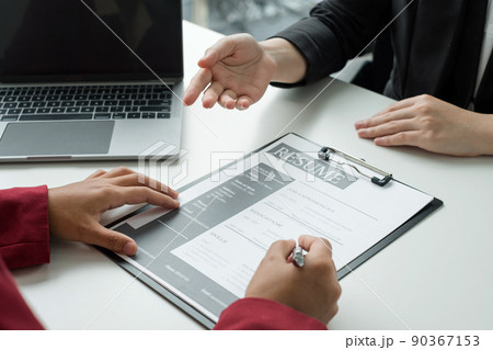Business people hold a resume and talk to job applicants for job interviews about careers and Their personal history in the company. Recruitment concepts 90367153
