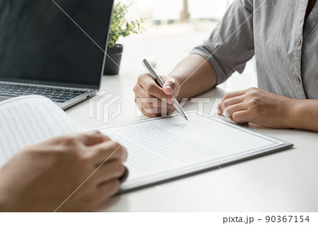 Business people hold a resume and talk to job applicants for job interviews about careers and Their personal history in the company. Recruitment concepts 90367154