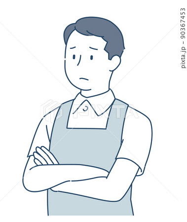 腕を組んで困っているエプロンの男性 90367453