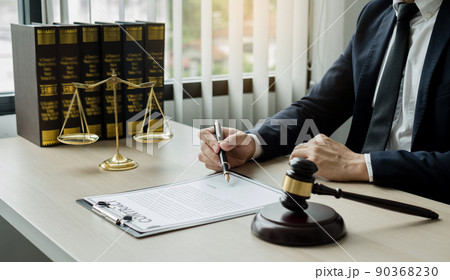 Professional man lawyers work at a law office There are scales, Scales of justice, judges gavel, and litigation documents. Concepts of law and justice Professional man lawyers work at a law office There are scales, Scales of justice, judges gavel, and litigation documents. Concepts of law and justice 90368230