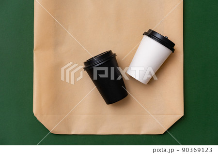 Textile shopping bag and coffee cup flat lay Textile shopping bag and coffee cup flat lay 90369123