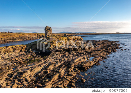 Aerial view of the amazing coast at St Johns Point next to Portned Island in County Donegal - Ireland. 90377005