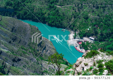 top view of the mountain river Sulak in Dagestan with boat jetty 90377120