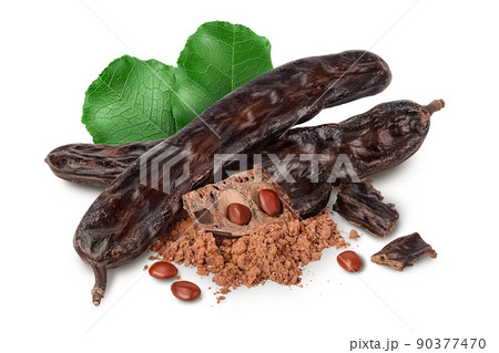 Carob pod and powder isolated on white background with full depth of field. Carob pod and powder isolated on white background with full depth of field. 90377470