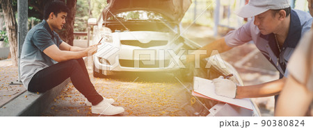 Asian man using smartphone for assistance after a car breakdown on street. Concept of vehicle engine problem or accident and emergency help from Professional mechanic Asian man using smartphone for assistance after a car breakdown on street. Concept of vehicle engine problem or accident and emergency help from Professional mechanic 90380824