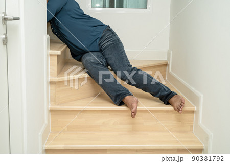 Asian lady woman patient fall down the stairs because slippery surfaces Asian lady woman patient fall down the stairs because slippery surfaces 90381792