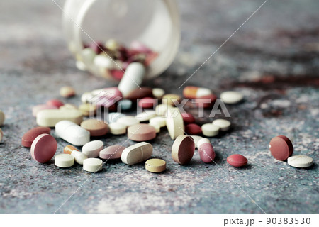 drug addiction concept with pills and wine glass on table drug addiction concept with pills and wine glass on table 90383530