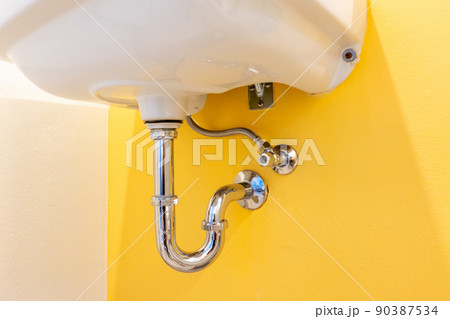 Drain pipe or sewer under sink. stainless steel pipe 90387534