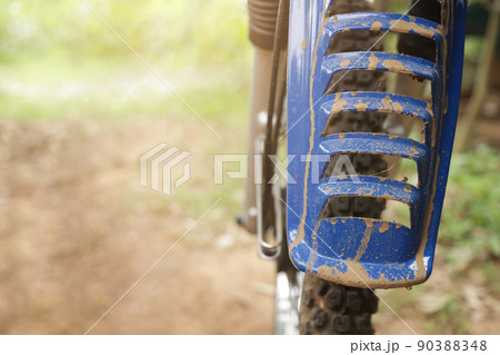 mud stick on front mud guard motorbike from long using in rainy season for cleaning concept mud stick on front mud guard motorbike from long using in rainy season for cleaning concept 90388348