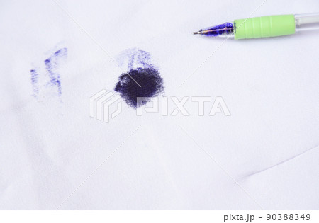Dirty blue ink stain on bag shirt  from using pen in daily life activity. dirty stains for cleaning  90388349