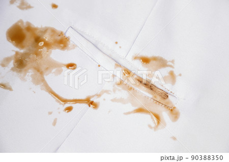 Dirty sauce stain on white shirt from eating in home of daily life activity. dirty stains cleaning 90388350