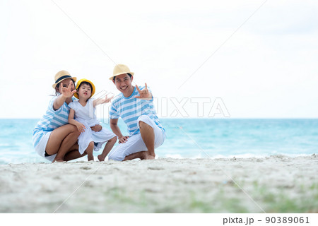 Happy family summer sea beach vacation. Asia young people lifestyle Happy family summer sea beach vacation. Asia young people lifestyle 90389061