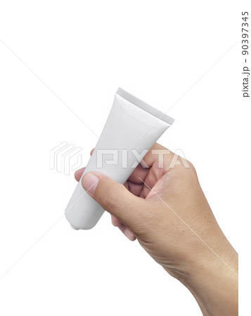 Human hand holding Cosmetic plastic tube isolated on white background Human hand holding Cosmetic plastic tube isolated on white background 90397345