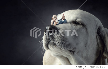 Little girl and giant dog Little girl and giant dog 90402175