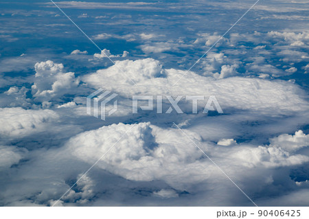 Aerial view to beautiful clouds from plane. Flight from Helsinki to Amsterdam. Aerial view to beautiful clouds from plane. Flight from Helsinki to Amsterdam. 90406425