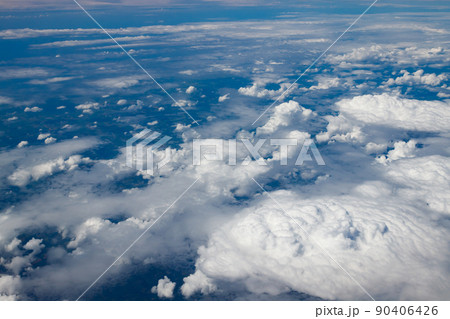 Aerial view to beautiful clouds from plane. Flight from Helsinki to Amsterdam. 90406426