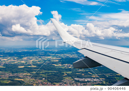 Plain wing over Belgium. Flight from Amsterdam to Brussels. 90406446