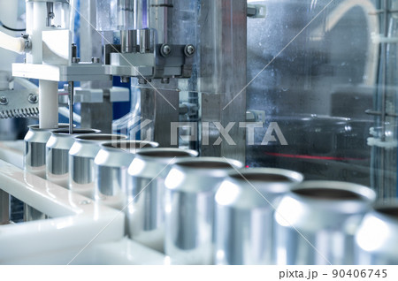 Empty new aluminum cans for drink process in factory line on conveyor belt machine at beverage 90406745