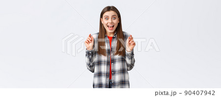 Lifestyle, different emotions, leisure activities concept. Excited and happy young attractive woman hear great news, rehoicing, congratulating friend, smiling upbeat and jumping from joy Lifestyle, different emotions, leisure activities concept. Excited and happy young attractive woman hear great news, rehoicing, congratulating friend, smiling upbeat and jumping from joy 90407942