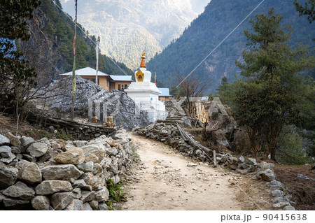 Mountain Trail Past a Buddhist Stupa Mountain Trail Past a Buddhist Stupa 90415638