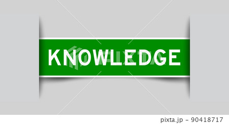 Inserted green color label sticker with word knowledge on gray background Inserted green color label sticker with word knowledge on gray background 90418717