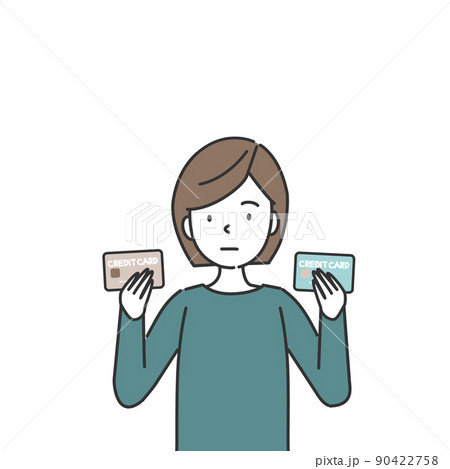 2枚のクレジットカードを持つ女性 90422758