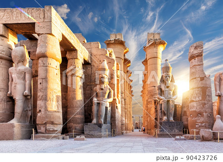Columns and statues of the Luxor temple main entrance, first pylon, Egypt 90423726