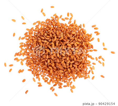 Camelina sativa seeds isolated on white background. Seeds of camelina or false flax. Raw material for the production of camelina oil. Top view. 90429154
