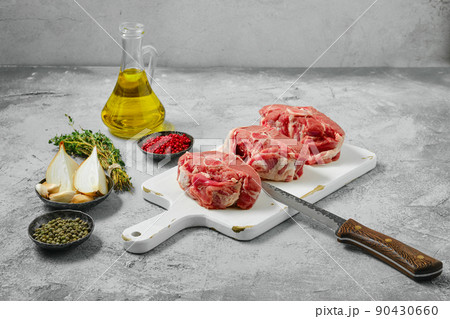 Uncooked raw lamb loin chops saddle steaks Uncooked raw lamb loin chops saddle steaks 90430660