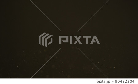 real dust particles in air with back light over black background 90432304