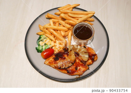 grilled chicken or chicken steak with French fries grilled chicken or chicken steak with French fries 90433754