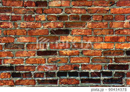background, texture of a heavily weathered old red brick wall background, texture of a heavily weathered old red brick wall 90434378