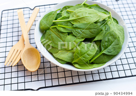Spinach leaves. Extremely nutrient-rich vegetable 90434994