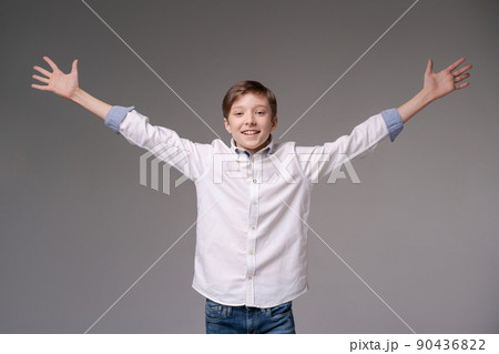 Young man screaming with happiness, celebrating triumph and victory, clenching Young man screaming with happiness, celebrating triumph and victory, clenching 90436822