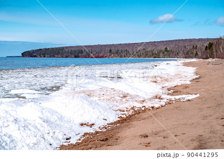 icy shoreline on lake superior in wisconsin 90441295
