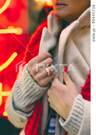 Detailed macro photo of an attractive woman in blue glasses in a Japanese neighborhood. Vertical photo. Detailed macro photo of an attractive woman in blue glasses in a Japanese neighborhood. Vertical photo. 90445738